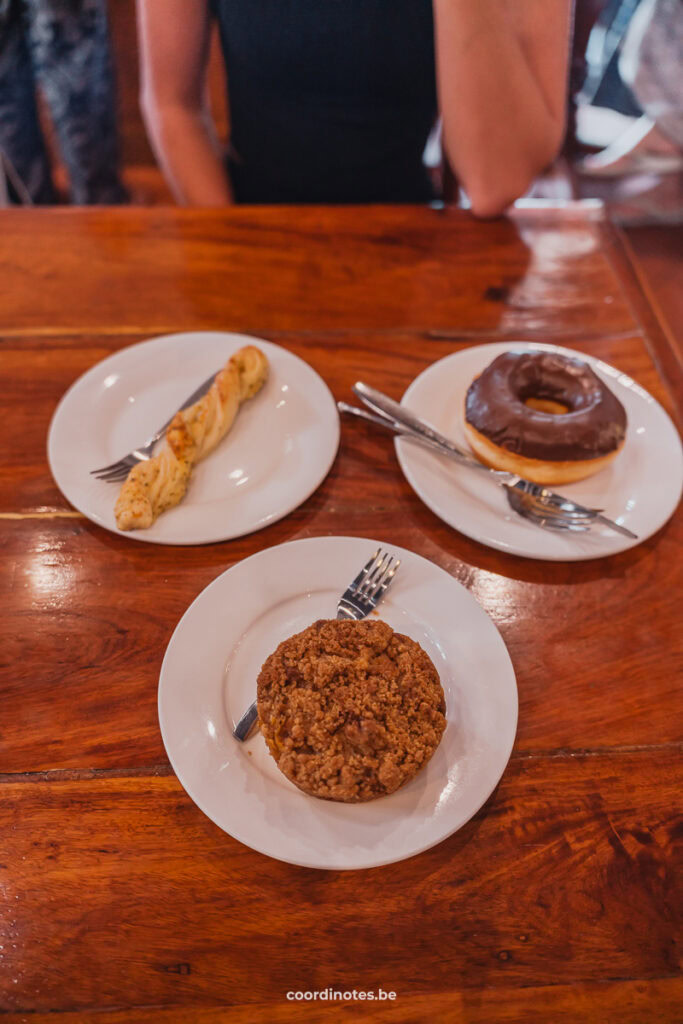 3 pastries on a table at Joma Bakery Cafe, a bakery in Luang Prabang