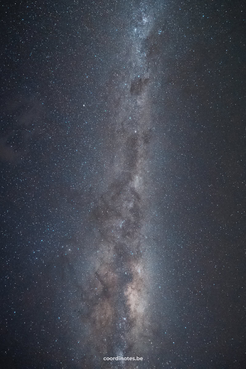 The Milky Way and thousands of stars in a dark sky.