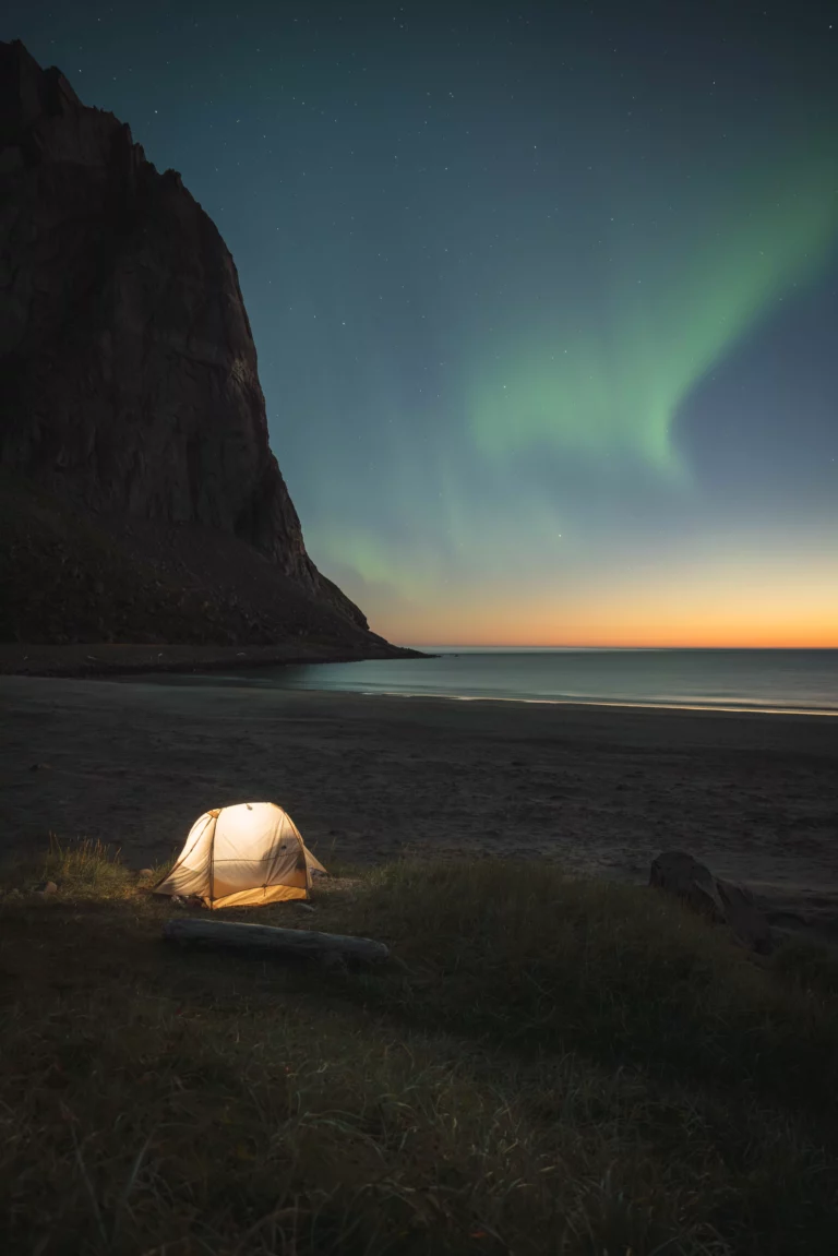 Northern Lights at Kvalvika Beach in Lofoten in summer