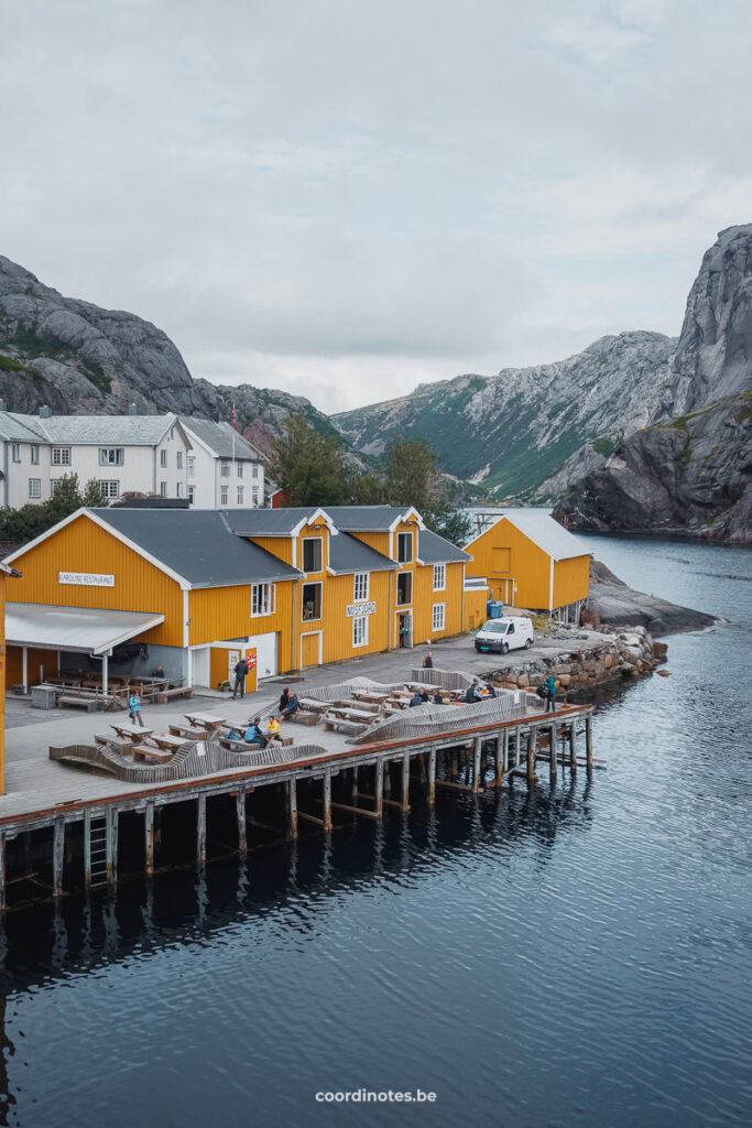 Yellow houses at the harbor in Nusfjord in Lofoten